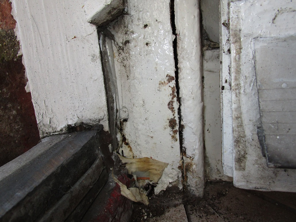 New timber spliced in now decaying