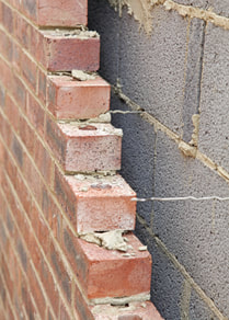 Brick and block cavity wall